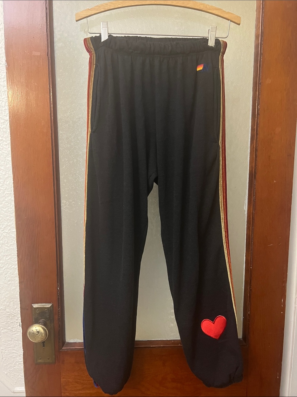 Aviator Nation Black Joggers with Red Heart and Rainbow Side Stripes